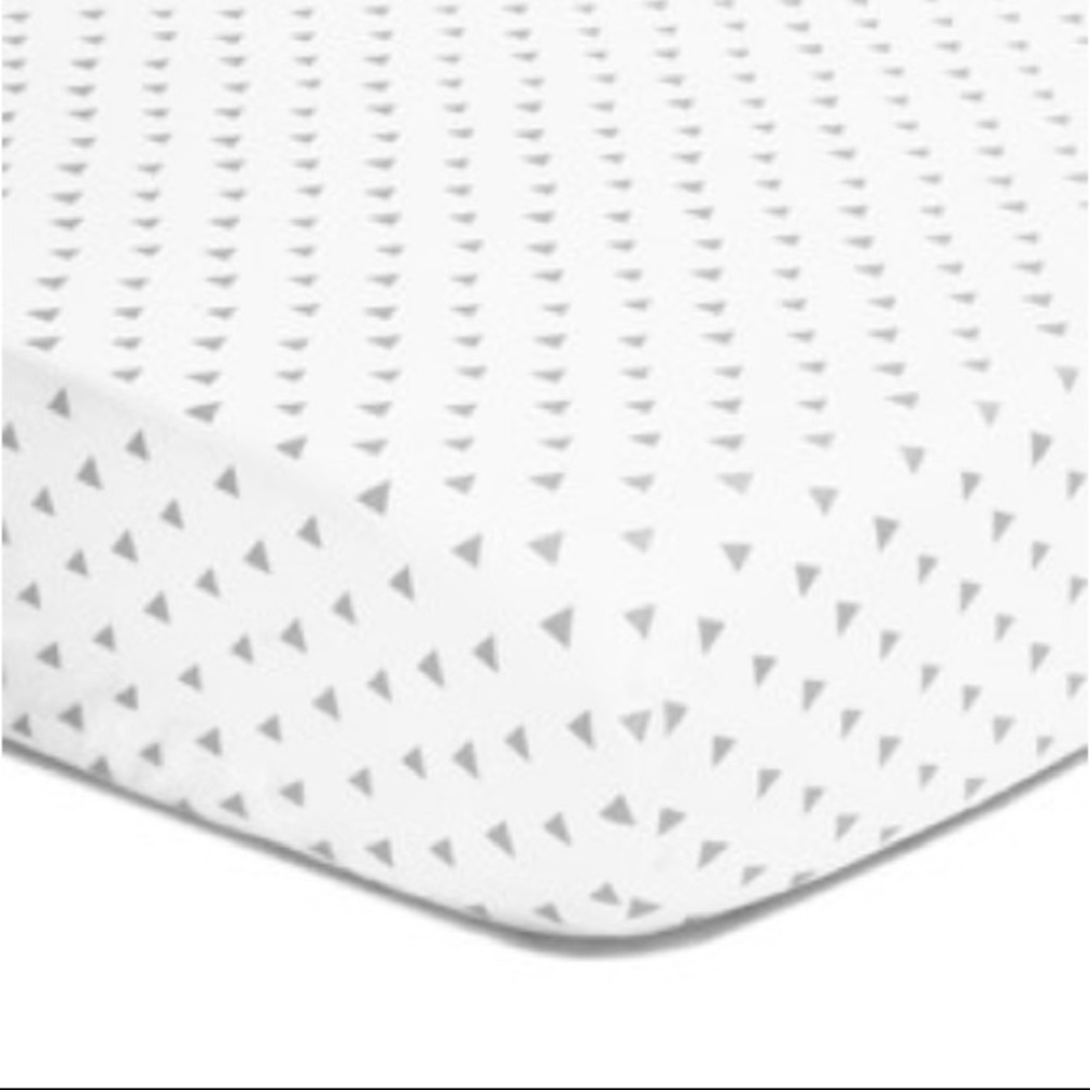 The Peanutshell Triangles Fitted Crib Sheet in Grey